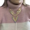 Statement gold necklace with geometric tribal design